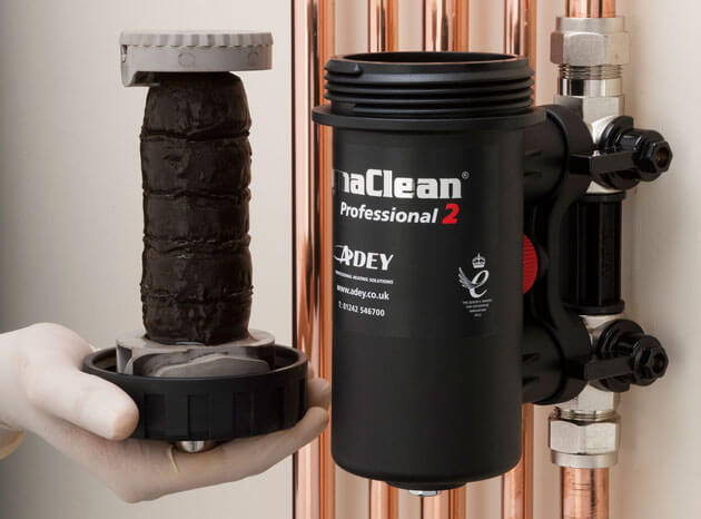 Magnaclean central heating filter showing what can be captured around it's powerful magnets