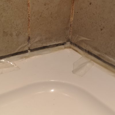 Shower tray leak before repair